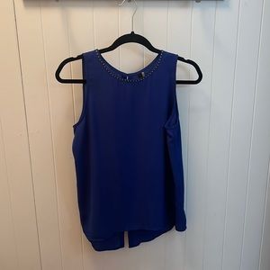 Sleeveless top with brass detail
